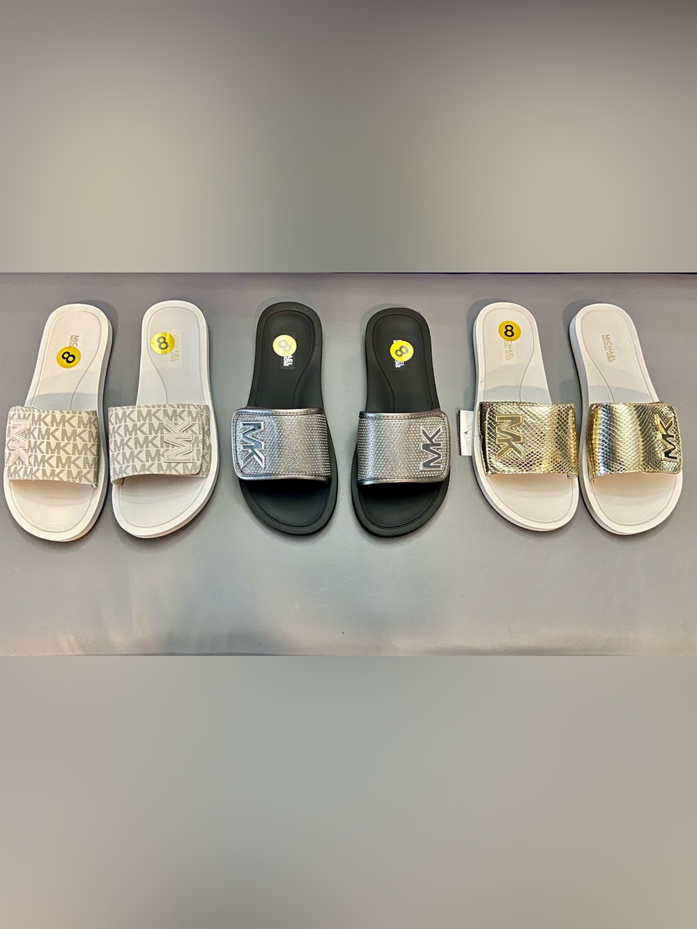 Michael Kors Metallic Logo Slide Sandals in Silver, Gold, and White